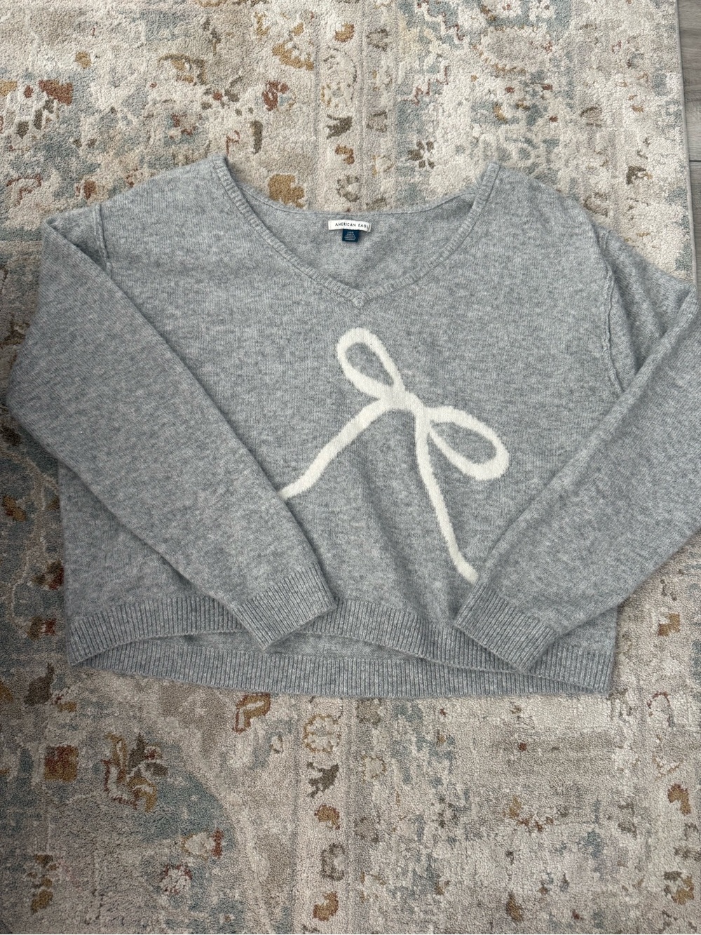American Eagle Outfitters Gray V-Neck Sweater with White Bow